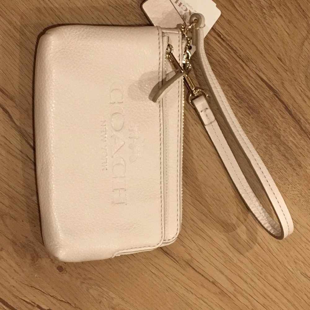 BRAND NEW COACH wristlet- cream color leather